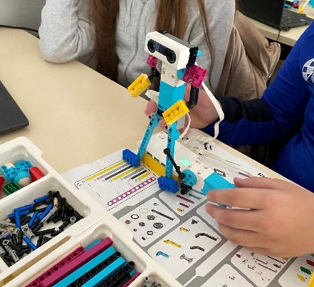 Robot in blue, white and yellow