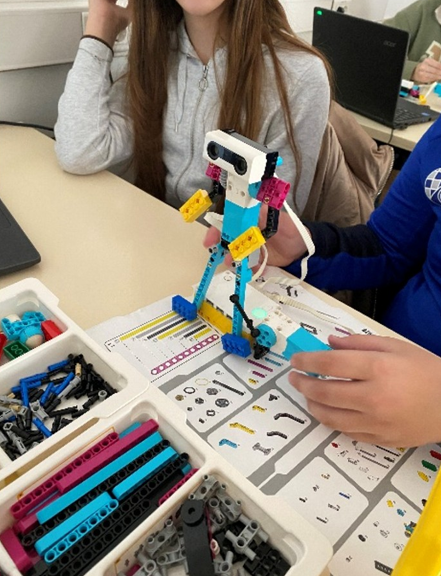 Robot in blue, white and yellow